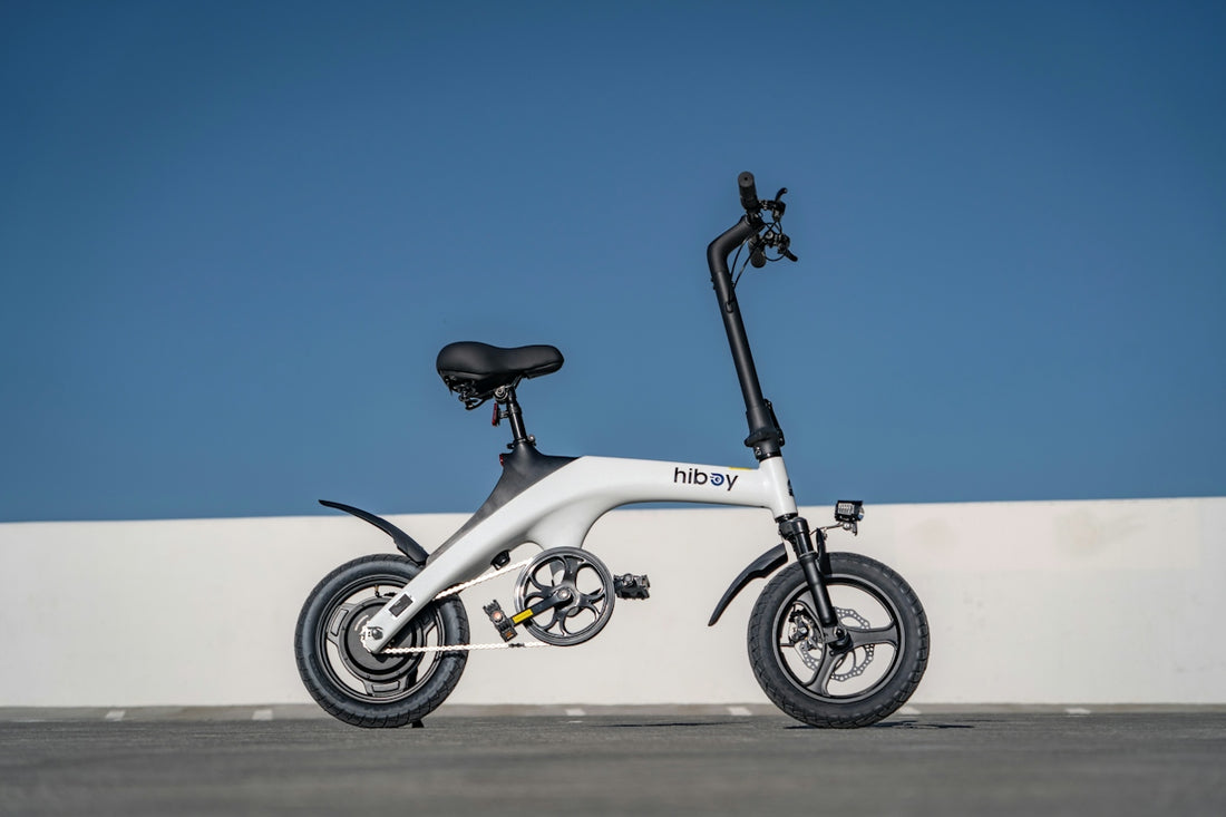 An electric scooter parked on the side of the road