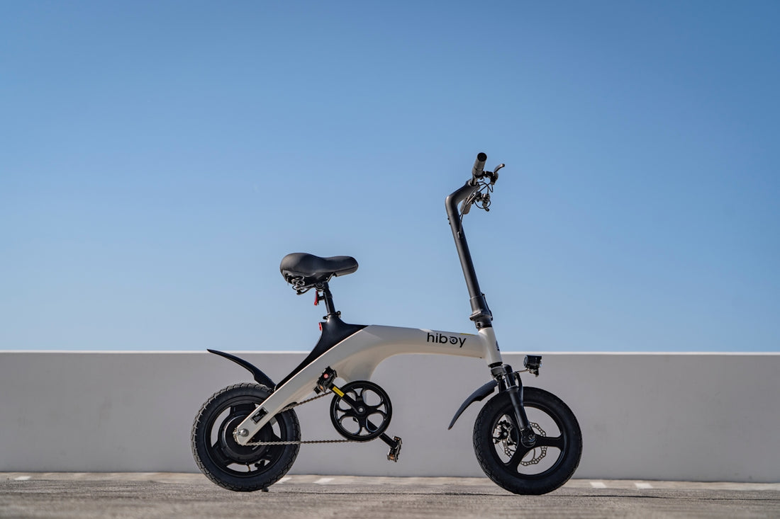 An electric bike parked on the side of a road