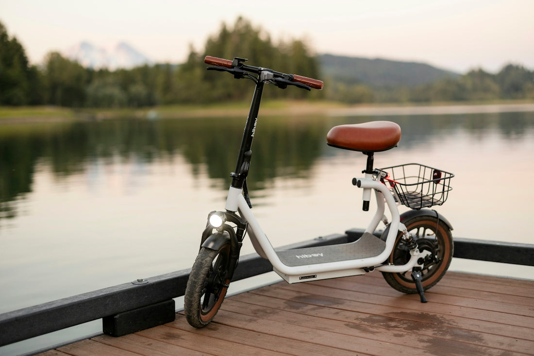 An electric scooter sits on a dock